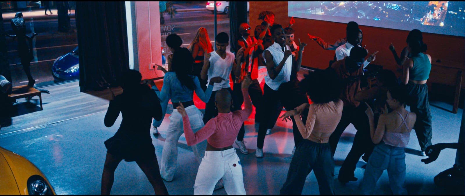 Guests dancing during a large event at the WiggleVerse